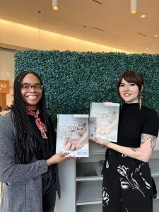 Two professors hold copies of the 2026 release of Understanding Human Sexuality